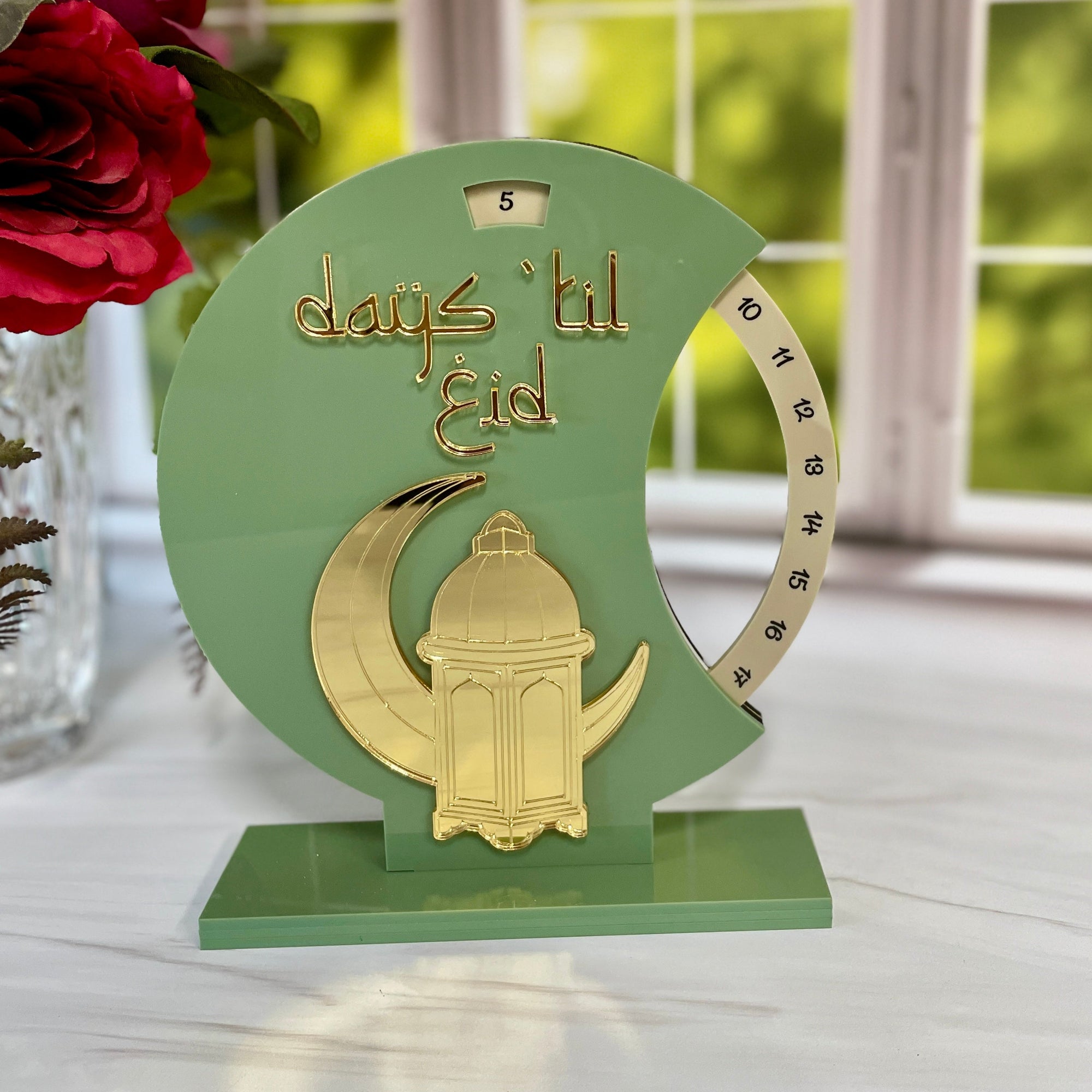 Perpetual calendar counting down days til eid featuring crescent and lantern laser cut on sage green and mirror gold acrylic