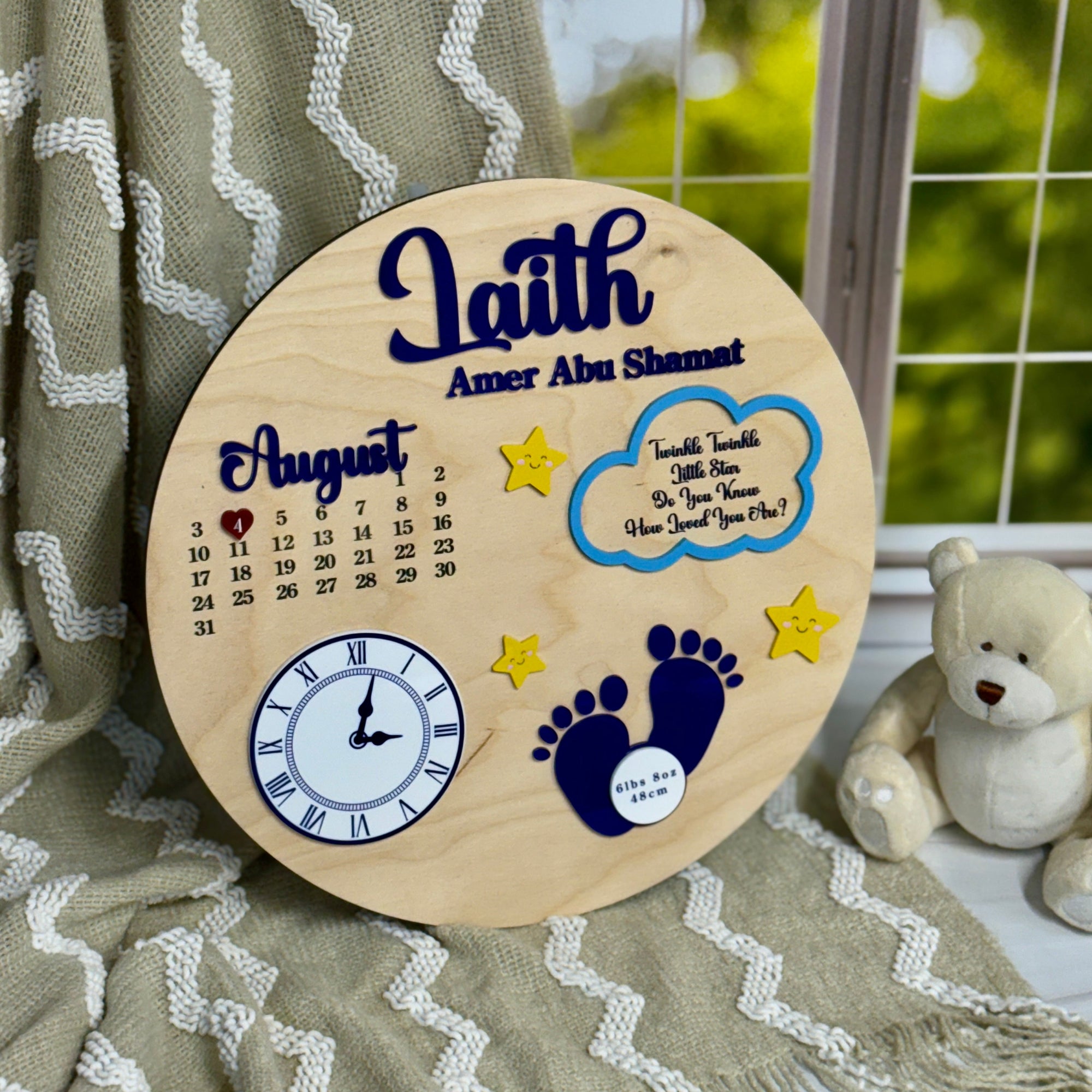 Wooden plaque with engraved text and graphics on a textured fabric background