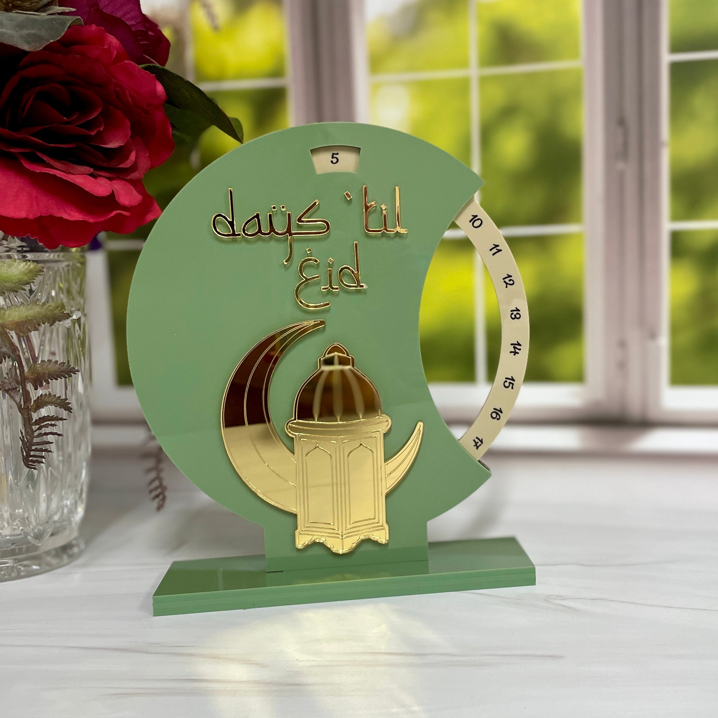 Perpetual calendar counting down days til eid featuring crescent and lantern laser cut on sage green and mirror gold acrylic