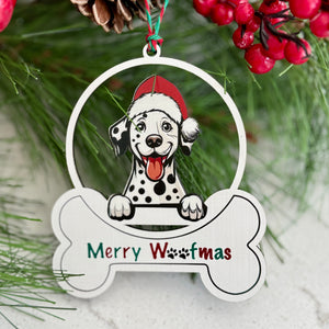 Christmas ornament with a dog wearing a Santa hat and 'Merry Woofmas' text, hanging on a tree.