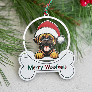 Dog ornament with a Santa hat on a bone-shaped tag, surrounded by Christmas decorations.