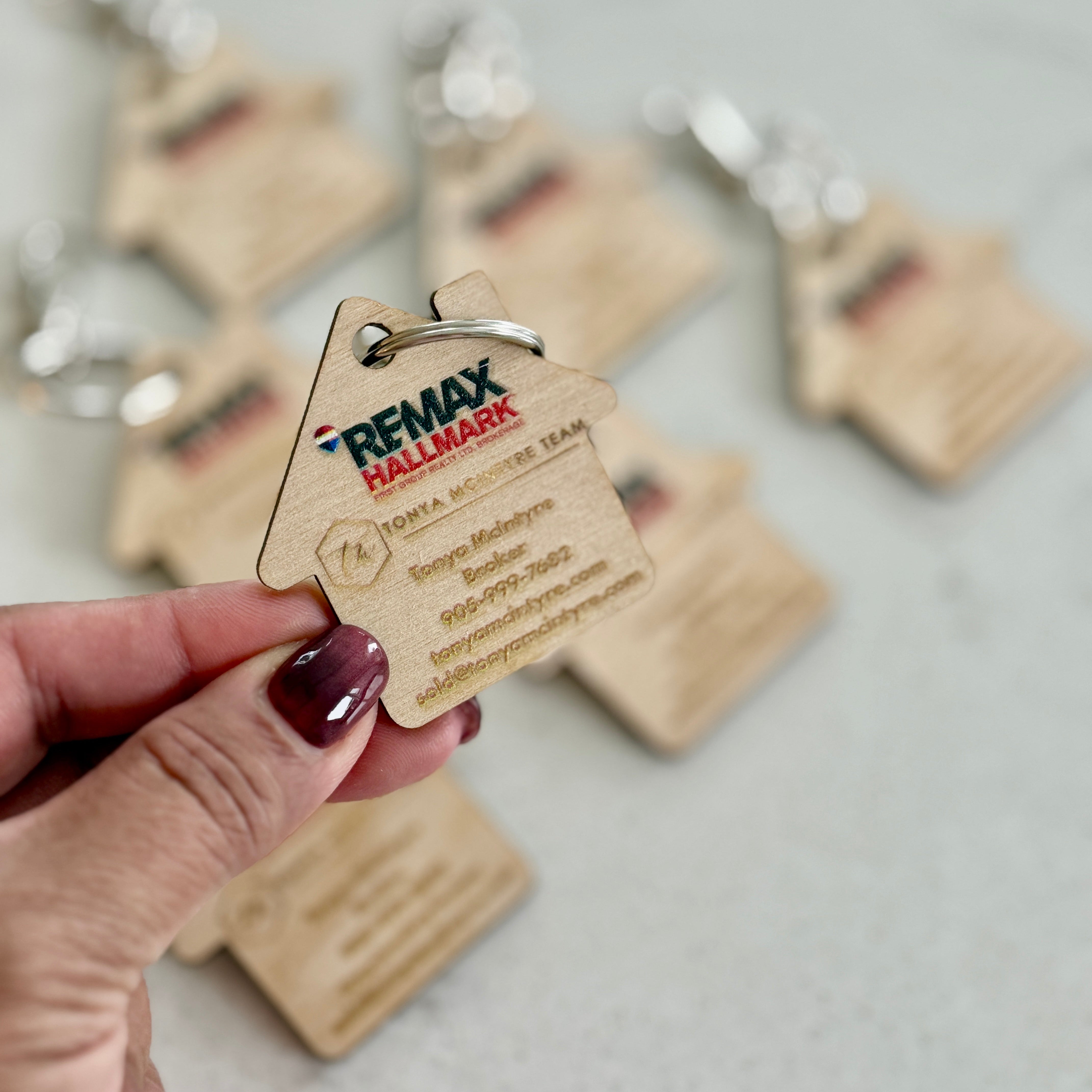 Custom house-shaped realtor keychains with your logo and contact info. Perfect closing gifts, open house giveaways, and everyday brand visibility.