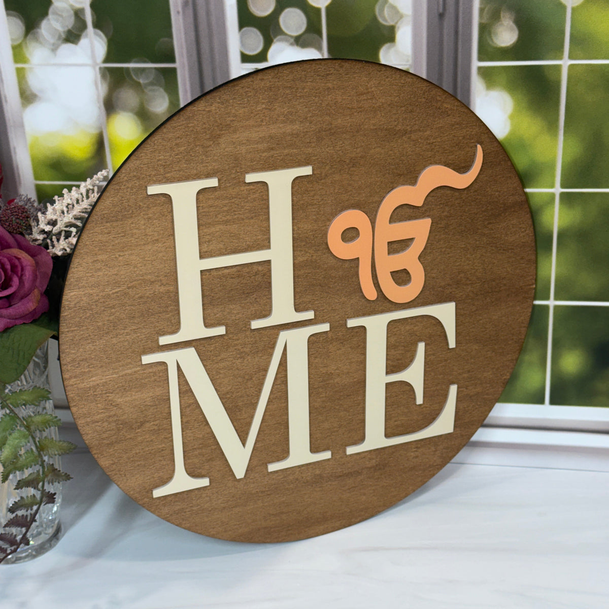 Round stained wood Sikh HOME sign with raised cream acrylic letters and orange Ik Onkar religious symbol, handcrafted home decor and housewarming gift.