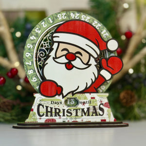Christmas countdown timer with Santa Claus design on a blurred festive background