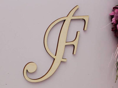 Stained wooden F sign
