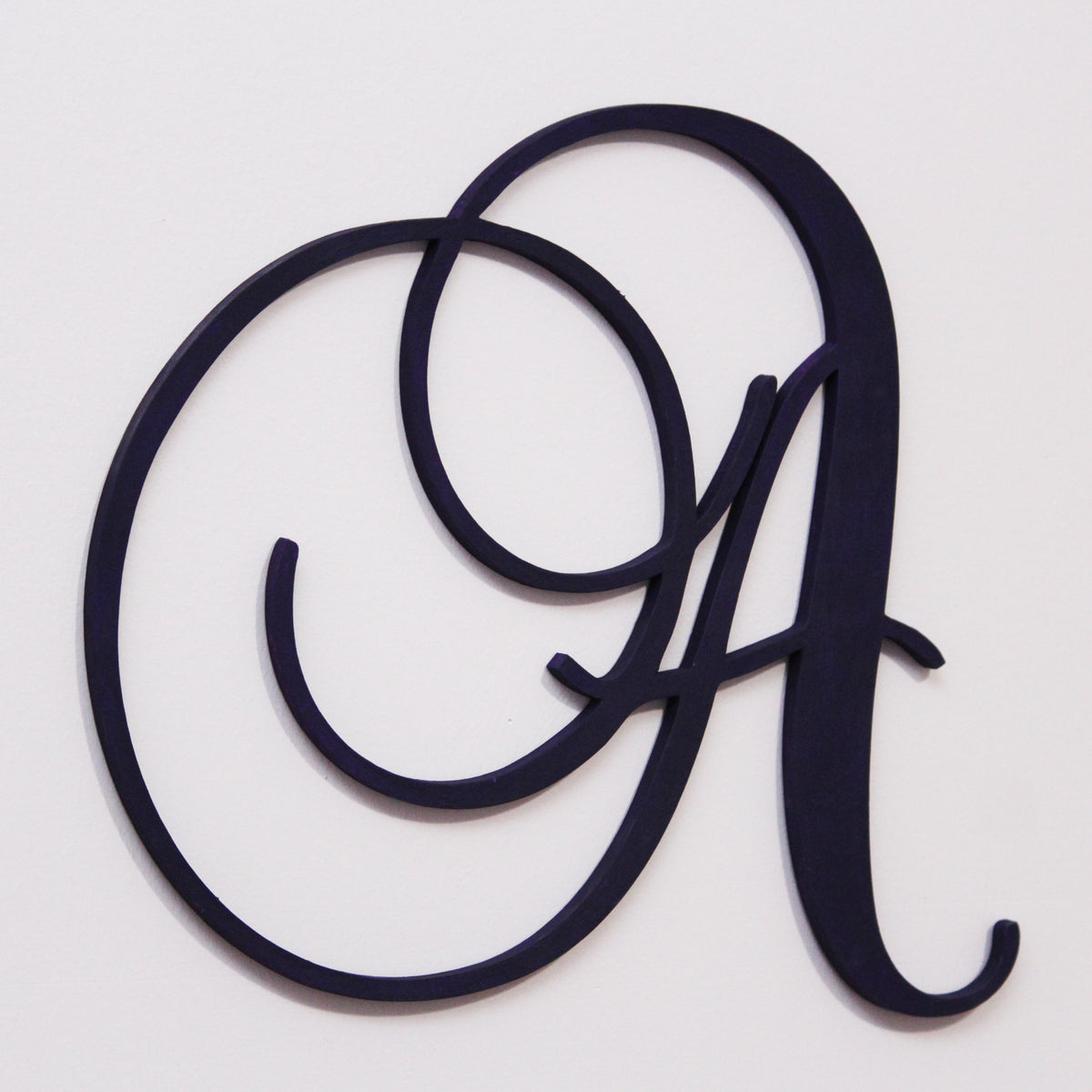 Large indigo letter A wooden sign