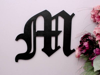 Old English Monogram cut out from wood and painted in black